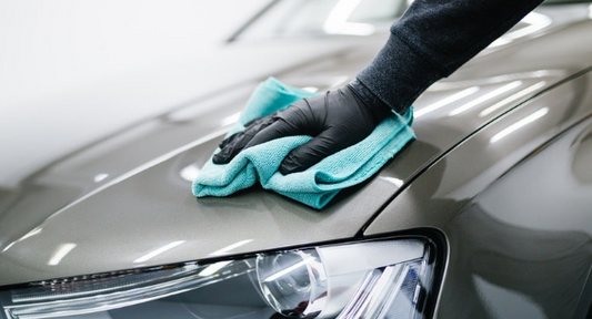 Clay bar treatment removing contaminants from car paint in Montreal