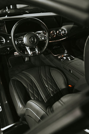 Mercedes-Benz AMG luxury car interior with black leather seats, diamond stitching, and premium dashboard – detailed by A&A Car Detailing Montréal & Laval.