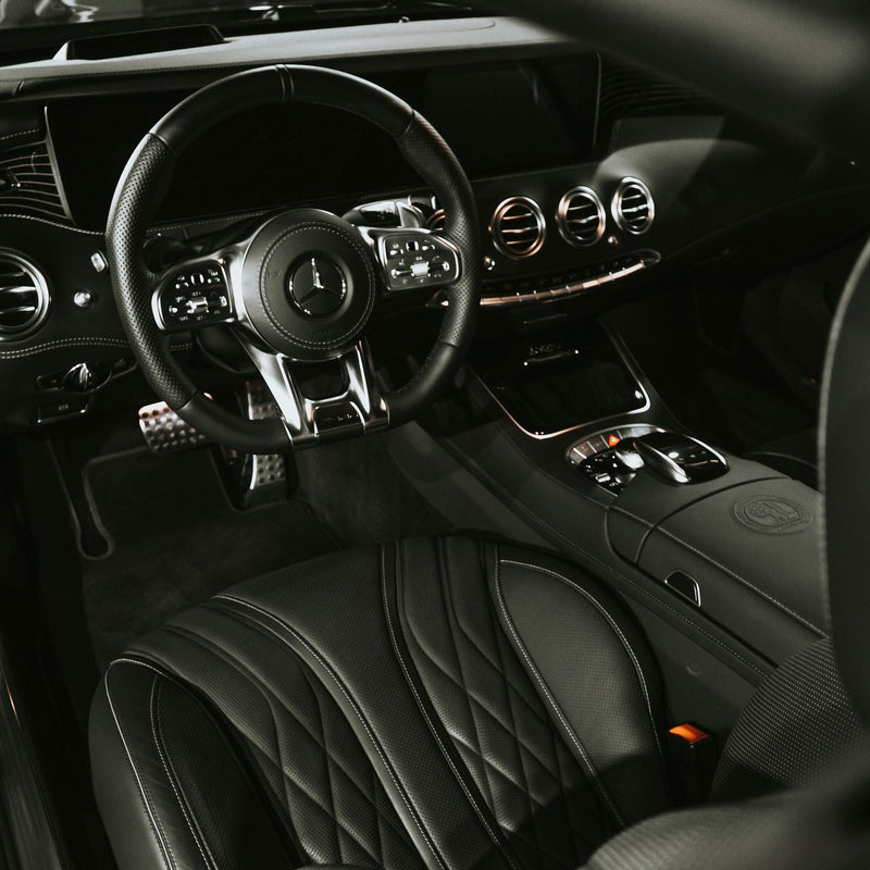 Mercedes-Benz AMG luxury car interior with black leather seats, diamond stitching, and premium dashboard – detailed by A&A Car Detailing Montréal & Laval.